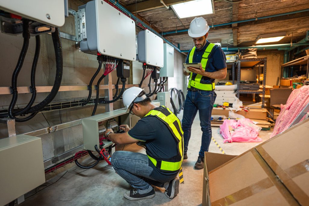 Service Engineer working inspection installation inverter solar